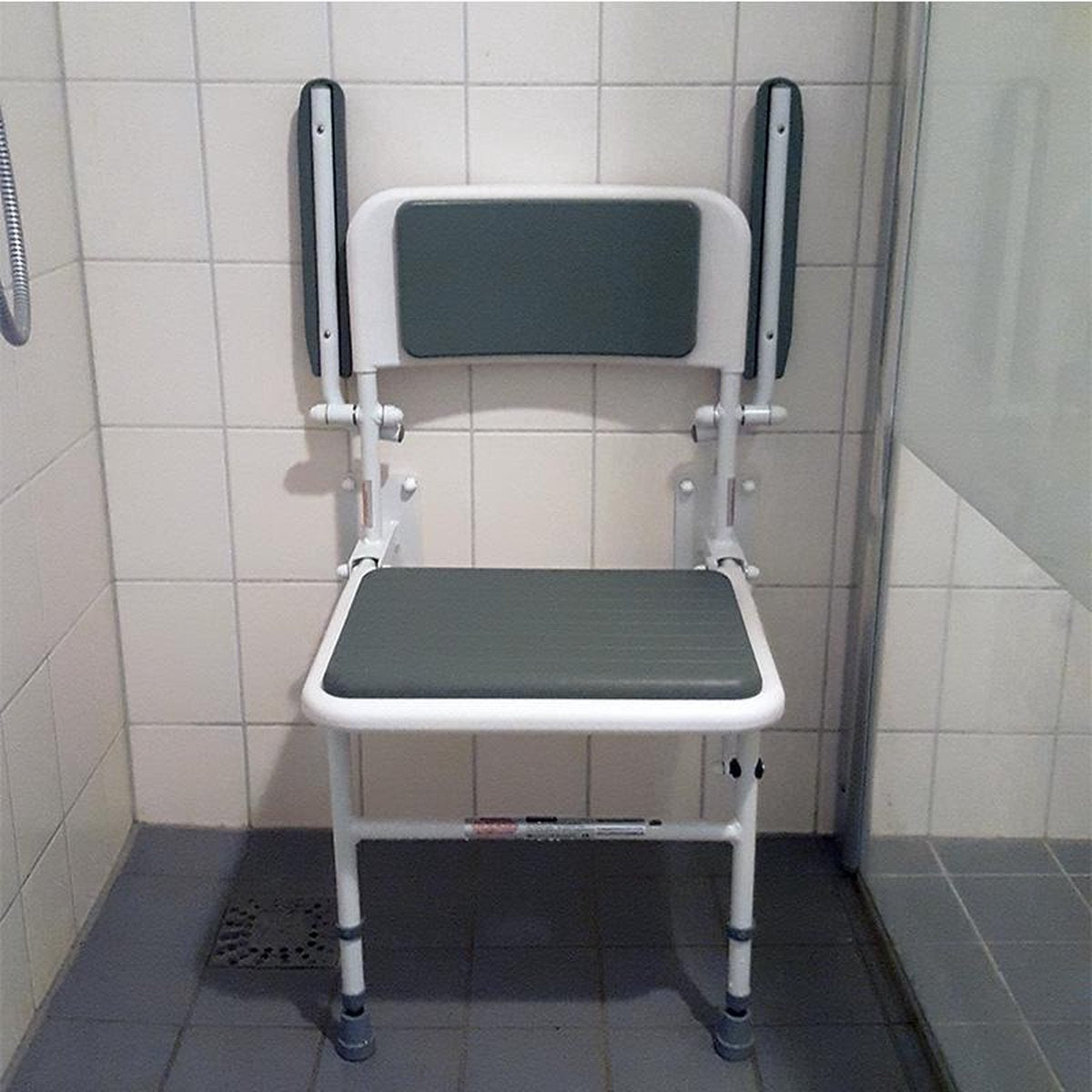 Shower chair wall with soft seat