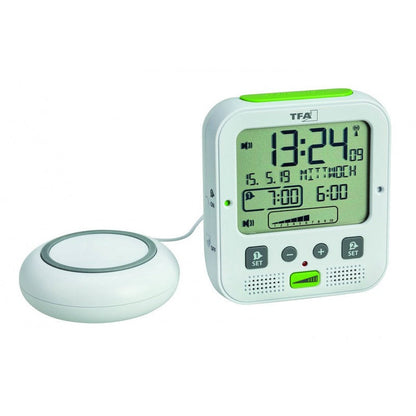 Radio alarm clock with vibrating alarm
